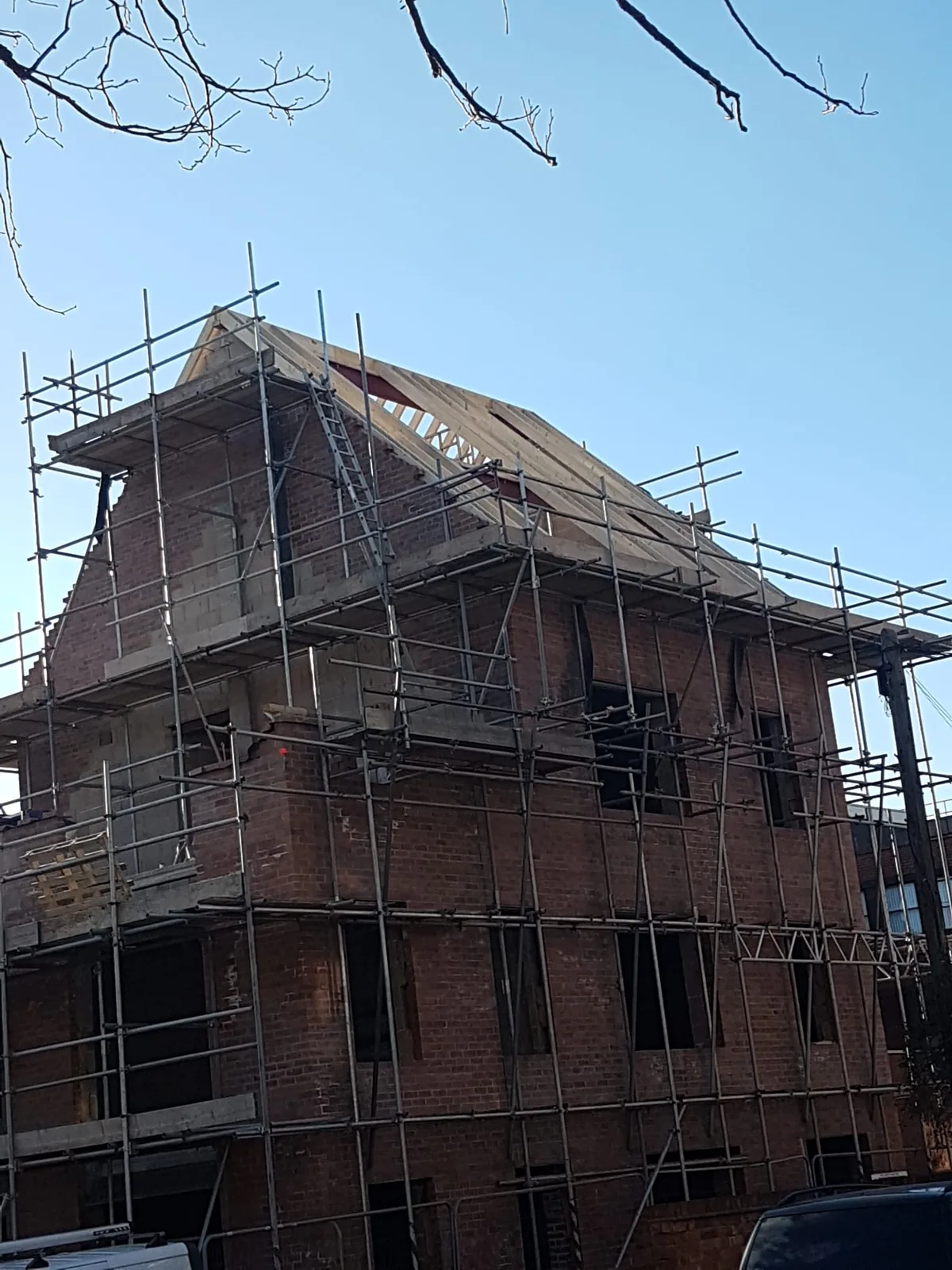 Residential development under construction with scaffolding