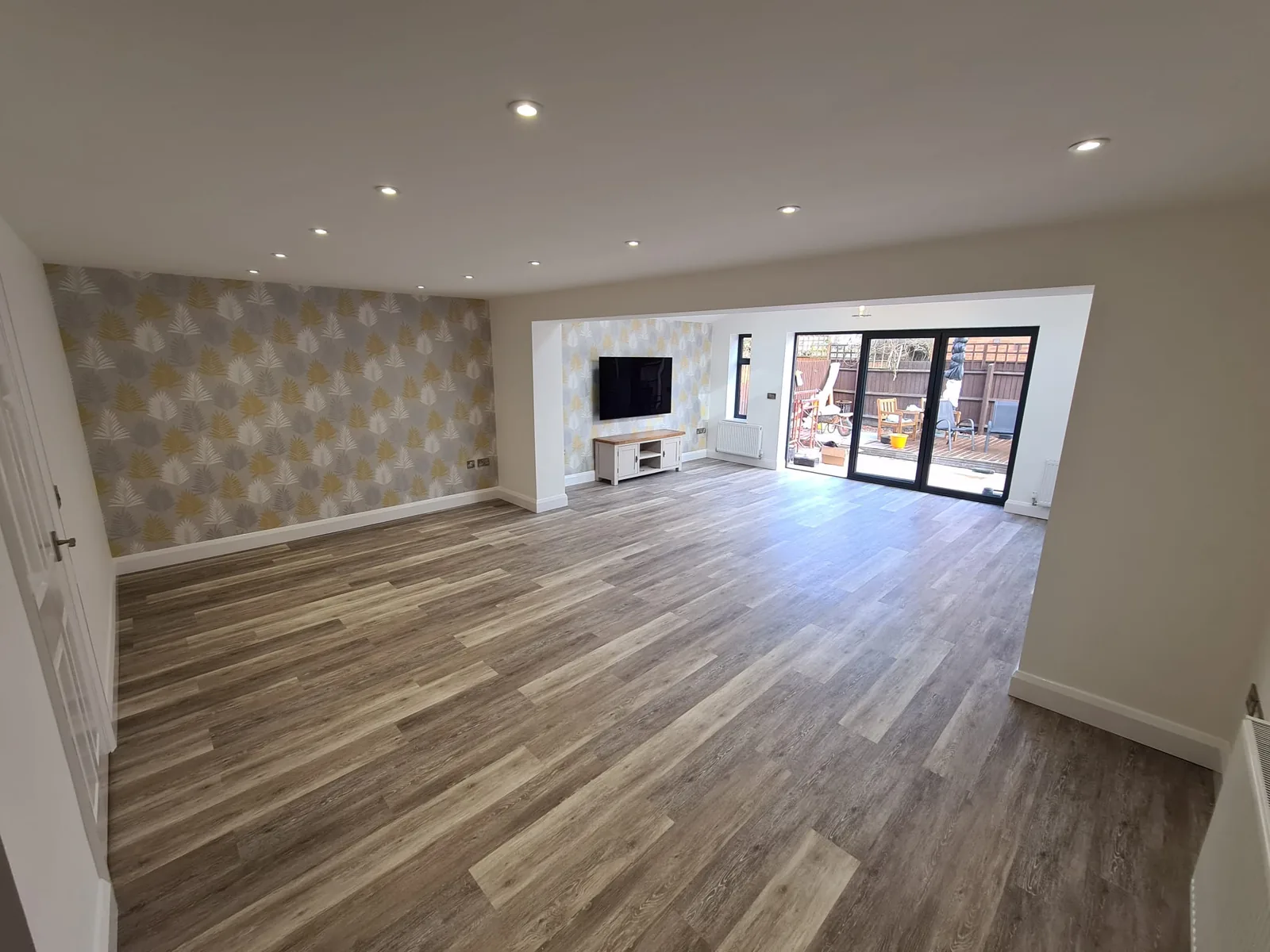 Completed open-plan living space after refurbishment