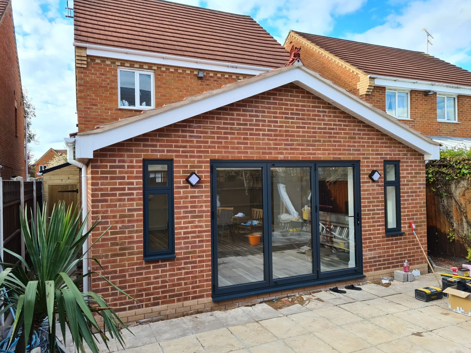 Completed brick rear extension with glazed doors